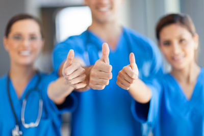 medical staffs giving thumbs up